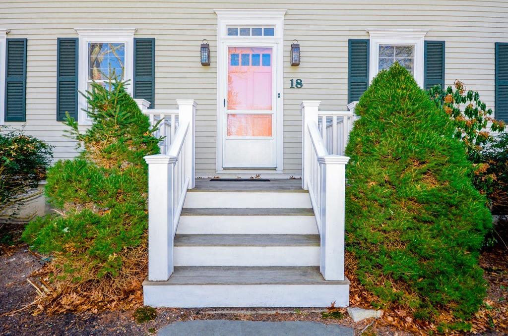 18 Zora Road Marion, MA 02738 - Photo 4 of 37 a view of a building with potted plants and windows