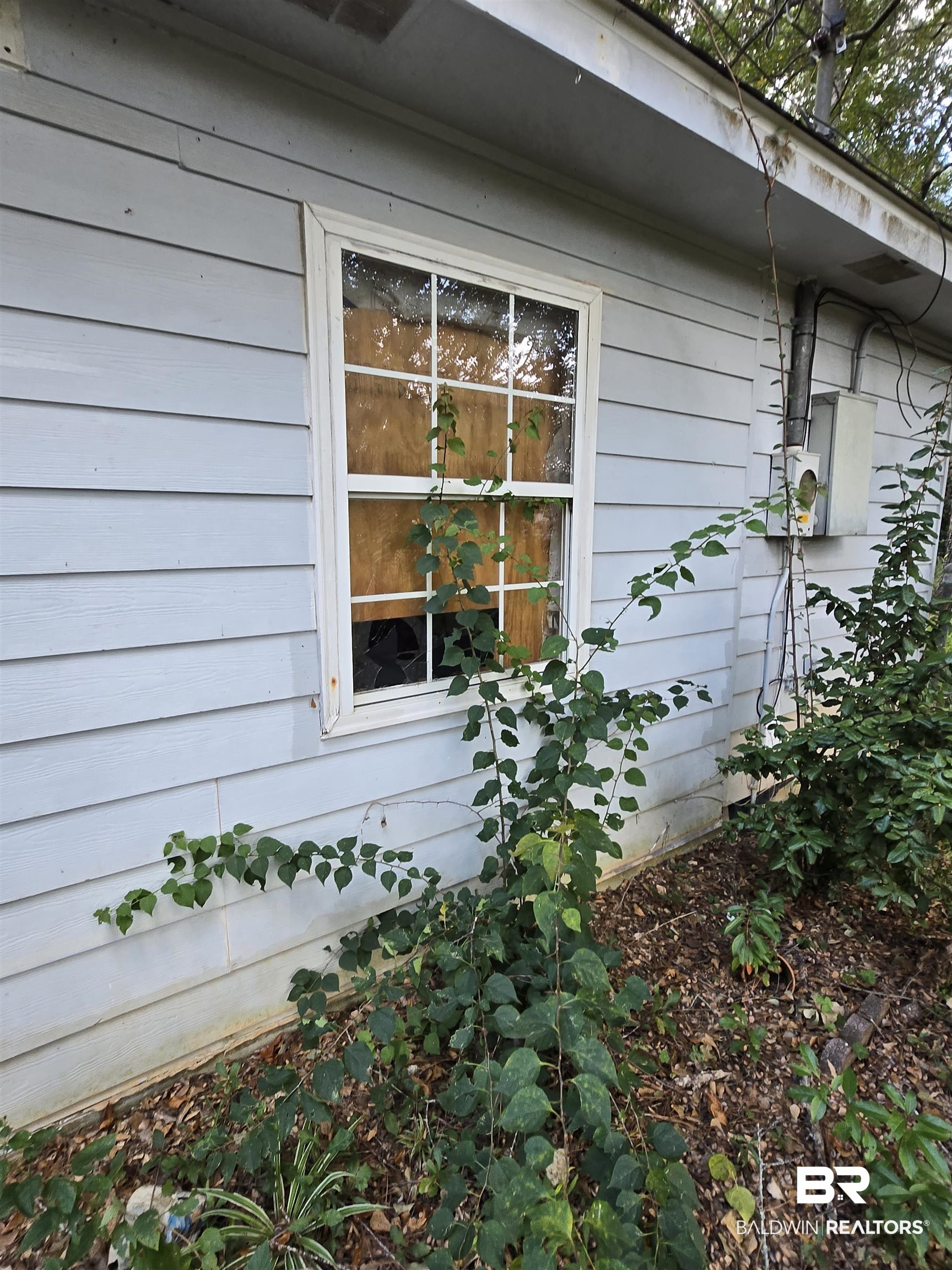 1820 North Cedar Street Foley, AL 36535 - Photo 4 of 14 View of side of home