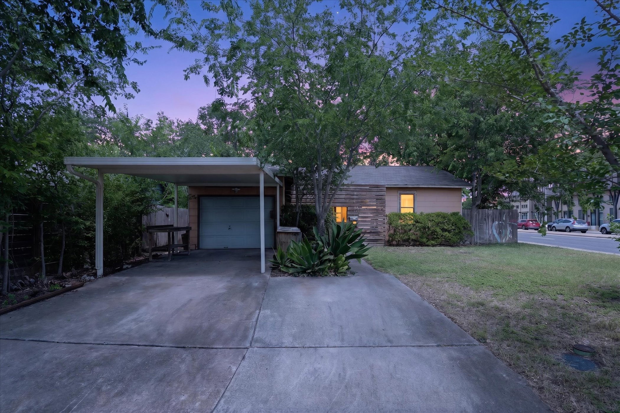 5701 Link Avenue Austin, TX 78752 - Photo 2 of 7 a front view of a house with garden