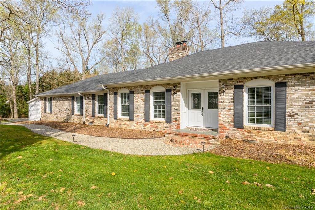3224 Allenwood Road Charlotte, NC 28270 - Photo 2 of 38 front view of a house with a yard