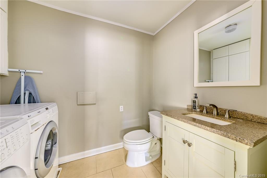 3224 Allenwood Road Charlotte, NC 28270 - Photo 15 of 38 a bathroom with a granite countertop sink toilet and a mirror