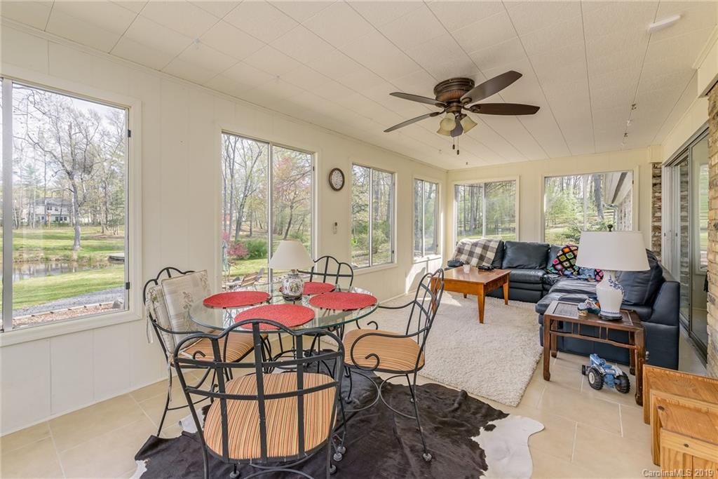 3224 Allenwood Road Charlotte, NC 28270 - Photo 16 of 38 a living room with furniture a window and a table