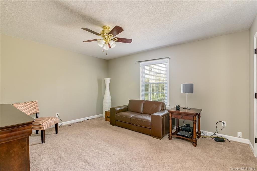 3224 Allenwood Road Charlotte, NC 28270 - Photo 18 of 38 a living room with furniture and a window