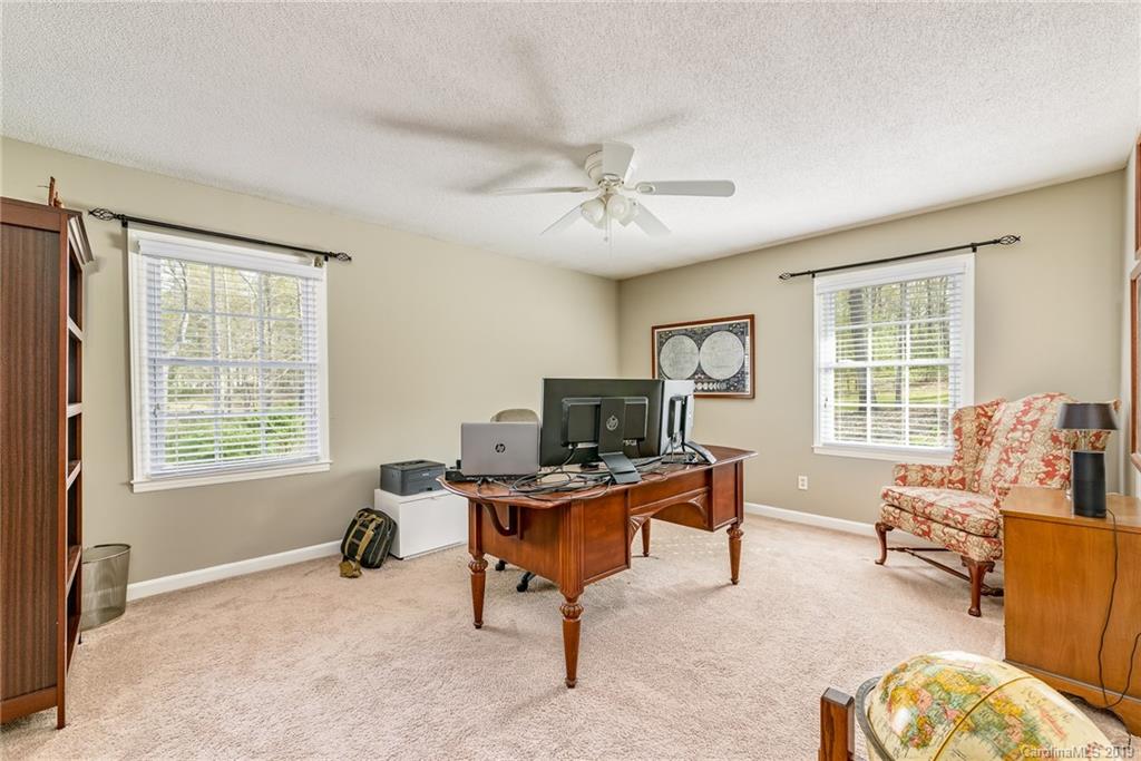 3224 Allenwood Road Charlotte, NC 28270 - Photo 20 of 38 a view of a livingroom with workspace and a window