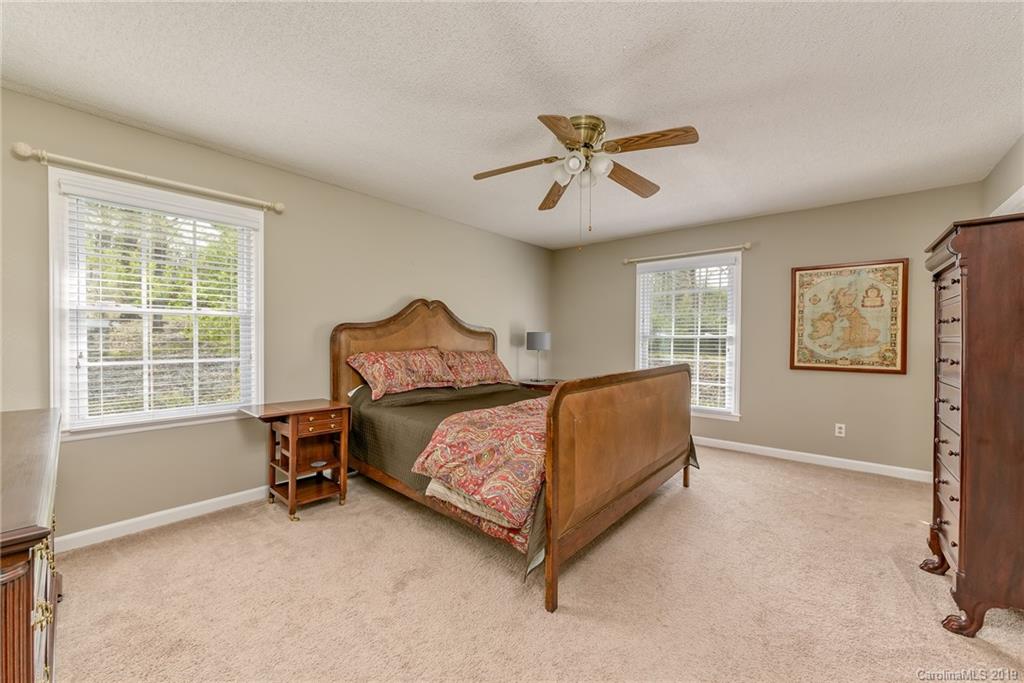 3224 Allenwood Road Charlotte, NC 28270 - Photo 21 of 38 a bedroom with a bed and a window