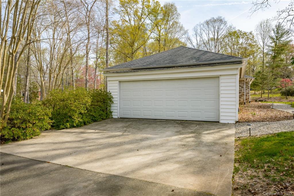 3224 Allenwood Road Charlotte, NC 28270 - Photo 24 of 38 a front view of a house with a garden
