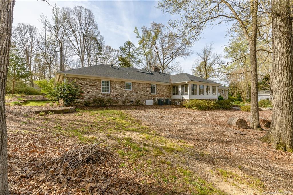 3224 Allenwood Road Charlotte, NC 28270 - Photo 29 of 38 a view of house with yard and sitting area