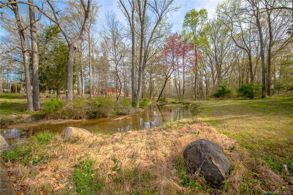 3224 Allenwood Road Charlotte, NC 28270 - Photo 33 of 38 a view of a yard with swimming pool