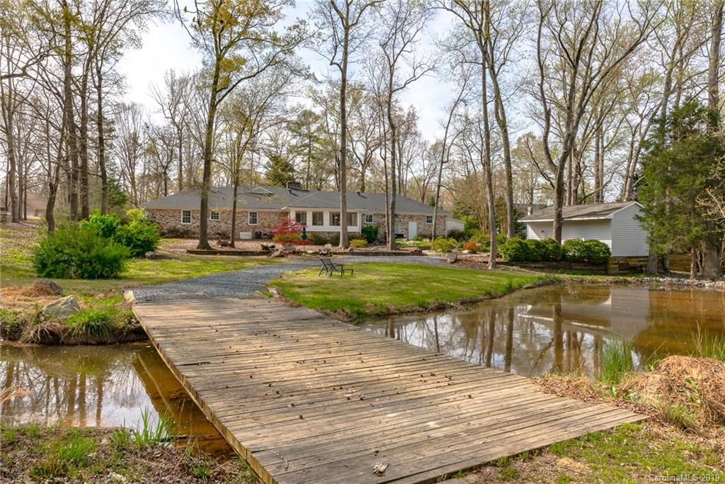 3224 Allenwood Road Charlotte, NC 28270 - Photo 37 of 38 a view of a lake with houses