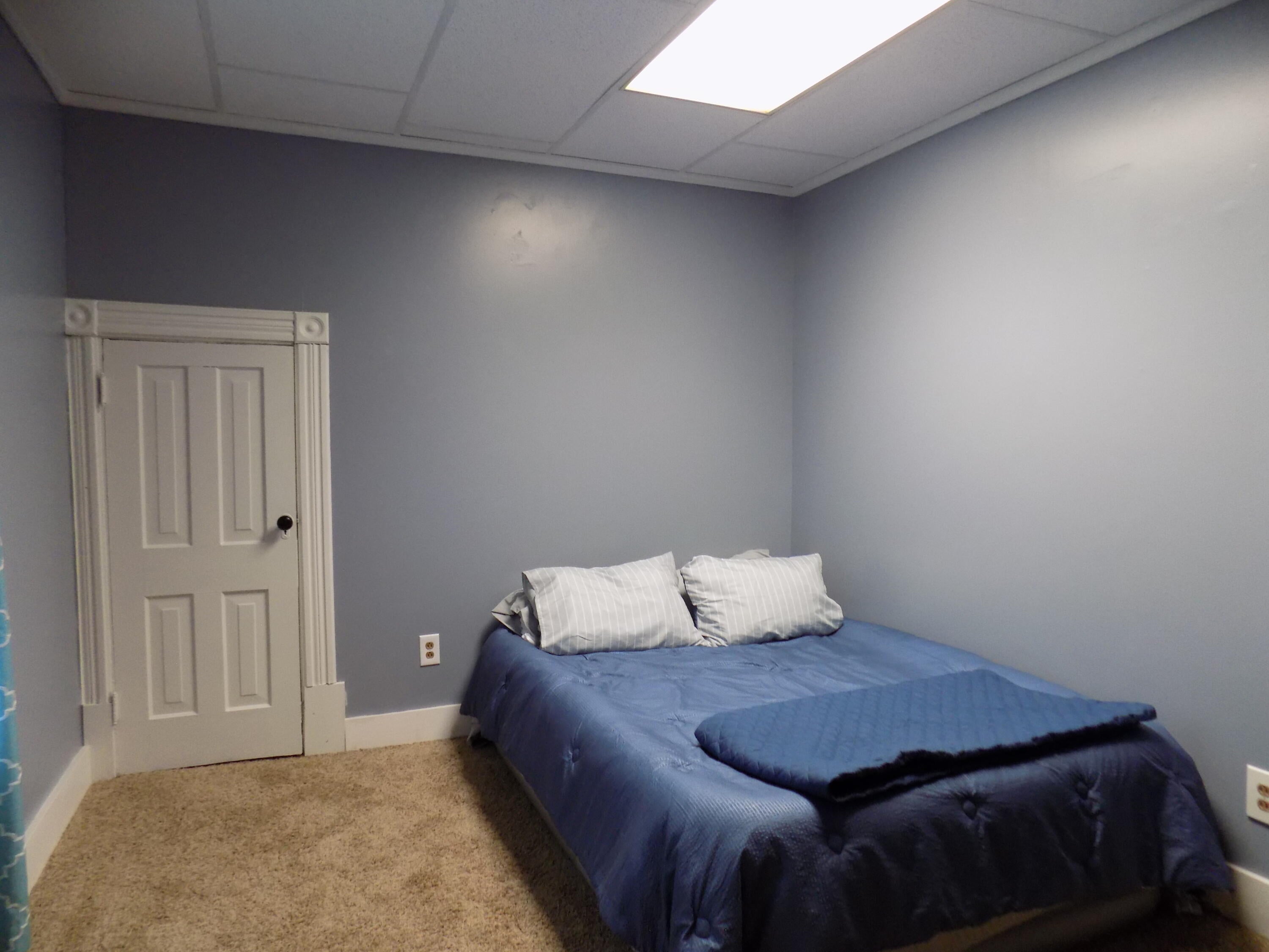 352 Young Street Cheboygan, MI 49721 - Photo 12 of 24 Main floor bedroom