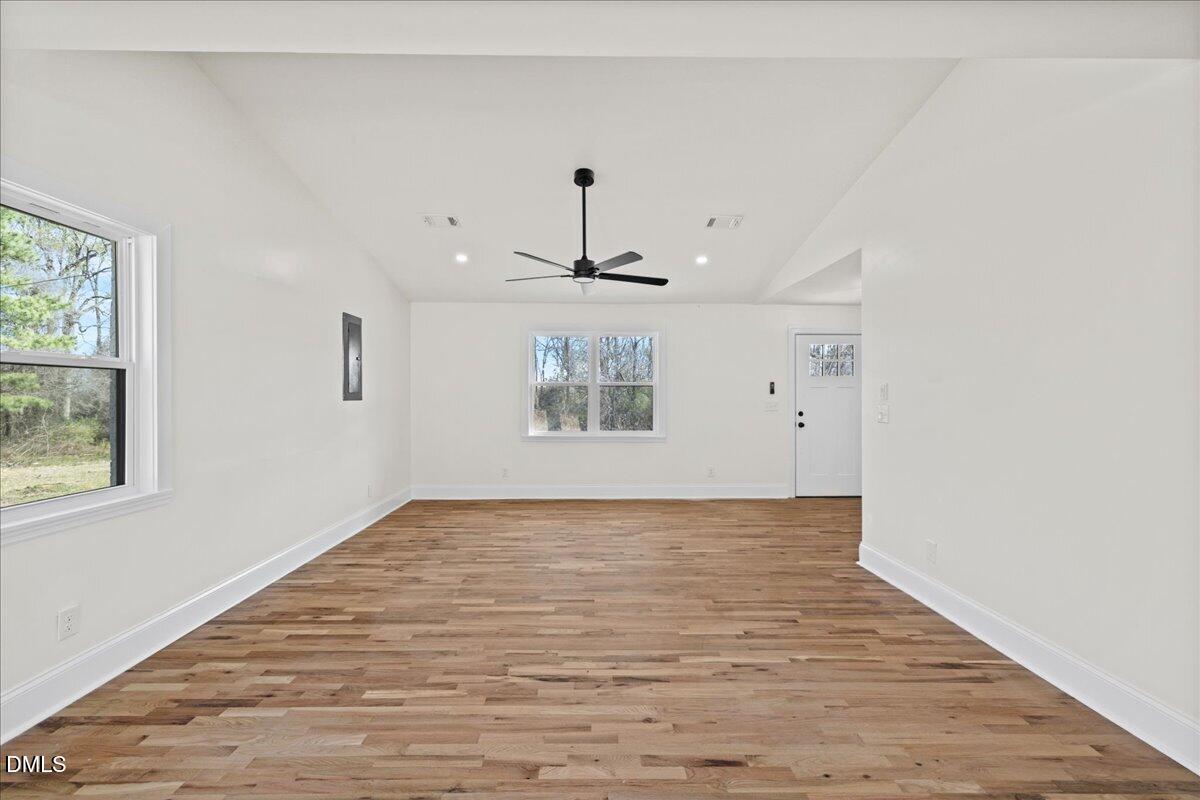 598 Bentonville Road Four Oaks, NC 27524 - Photo 11 of 40 a view of an empty room with window