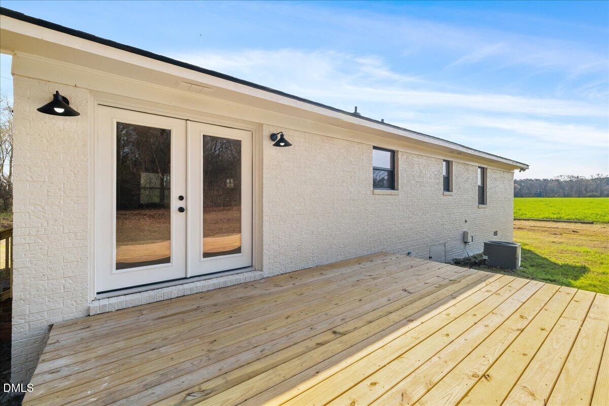 598 Bentonville Road Four Oaks, NC 27524 - Photo 32 of 40 a front view of a house with a yard