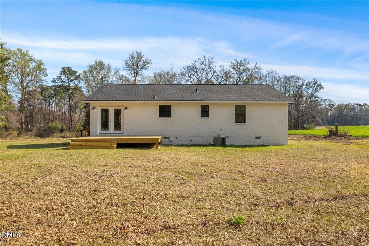 598 Bentonville Road Four Oaks, NC 27524 - Photo 34 of 40 a house view with a garden space