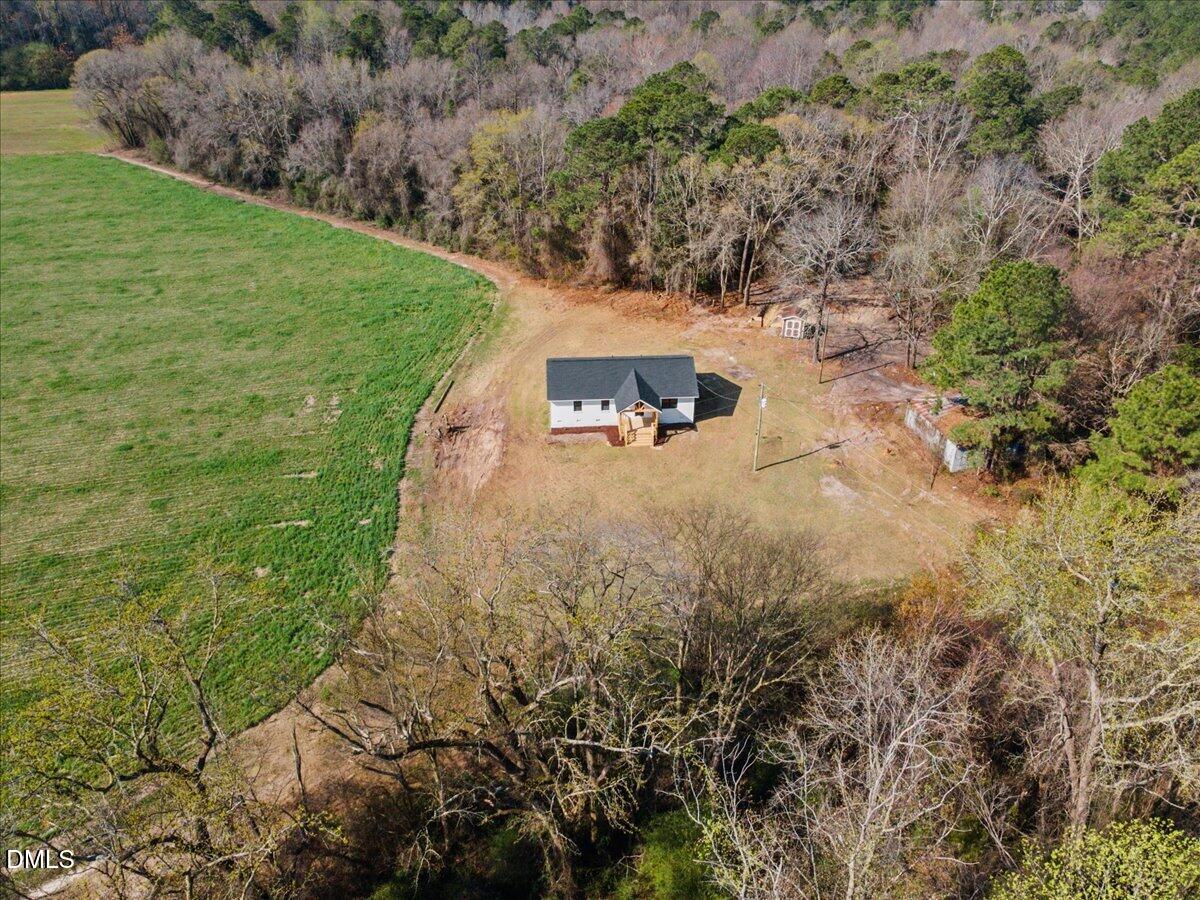598 Bentonville Road Four Oaks, NC 27524 - Photo 38 of 40 an aerial view of residential house with outdoor space