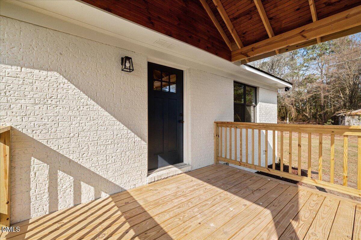 598 Bentonville Road Four Oaks, NC 27524 - Photo 6 of 40 a view of a balcony