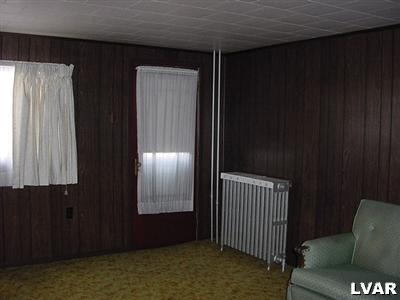 230 West Ridge Street Lansford, PA 18232 - Photo 3 of 3 a view of empty room with windows