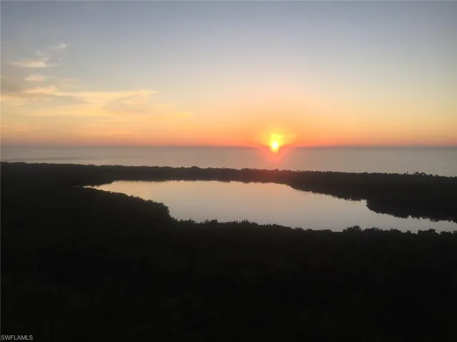 a view of lake and mountain