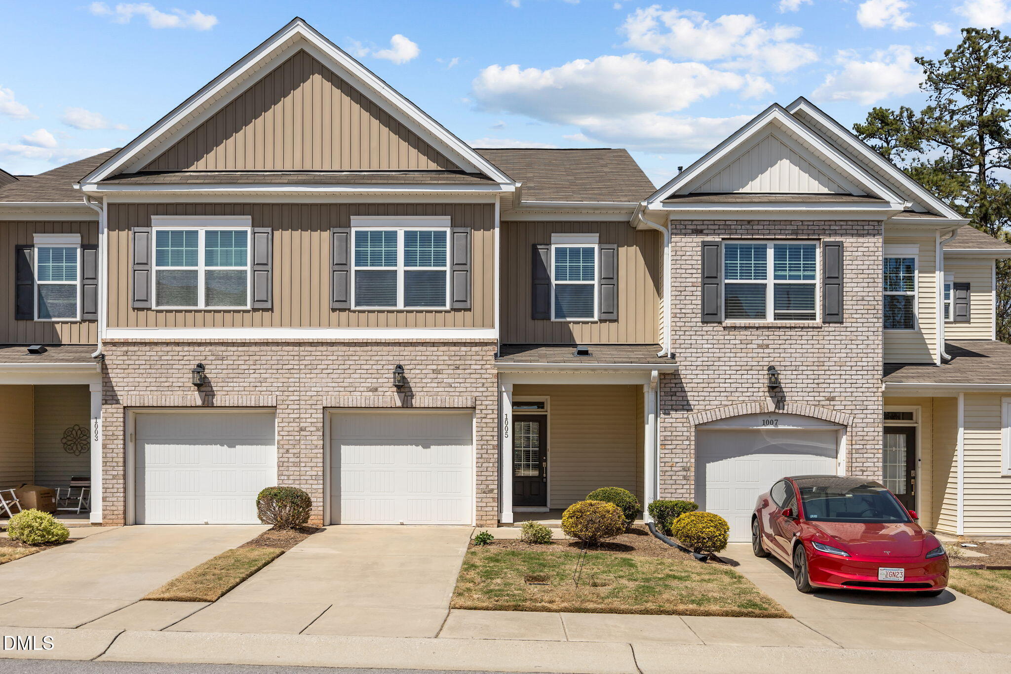 1005 Epiphany Road Morrisville, NC 27560 - Photo 1 of 23 a front view of a house with a yard