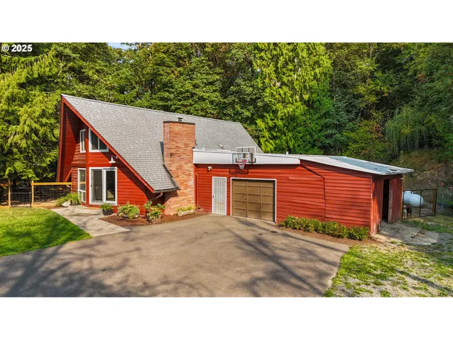 a view of a backyard with a small cabin