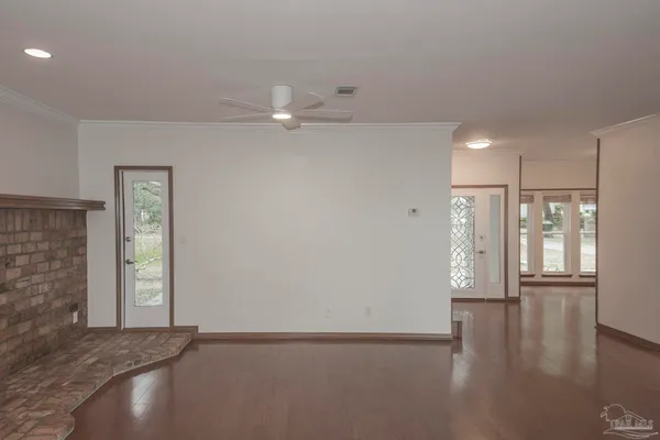 a kitchen with stainless steel appliances a refrigerator and a stove
