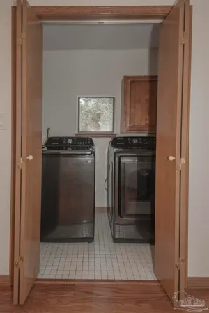 a view of a hallway with closet