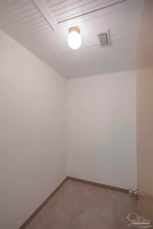 a white bath tub sitting in a bathroom