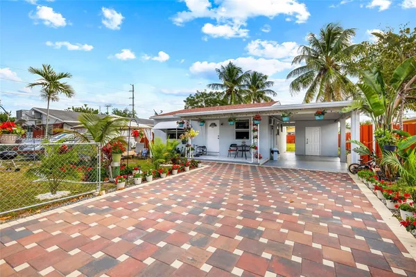 a view of a house with a patio