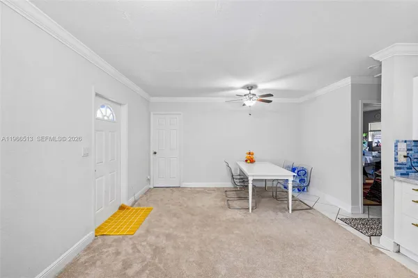 a view of a room with furniture and toys
