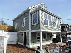 a front view of a house with balcony