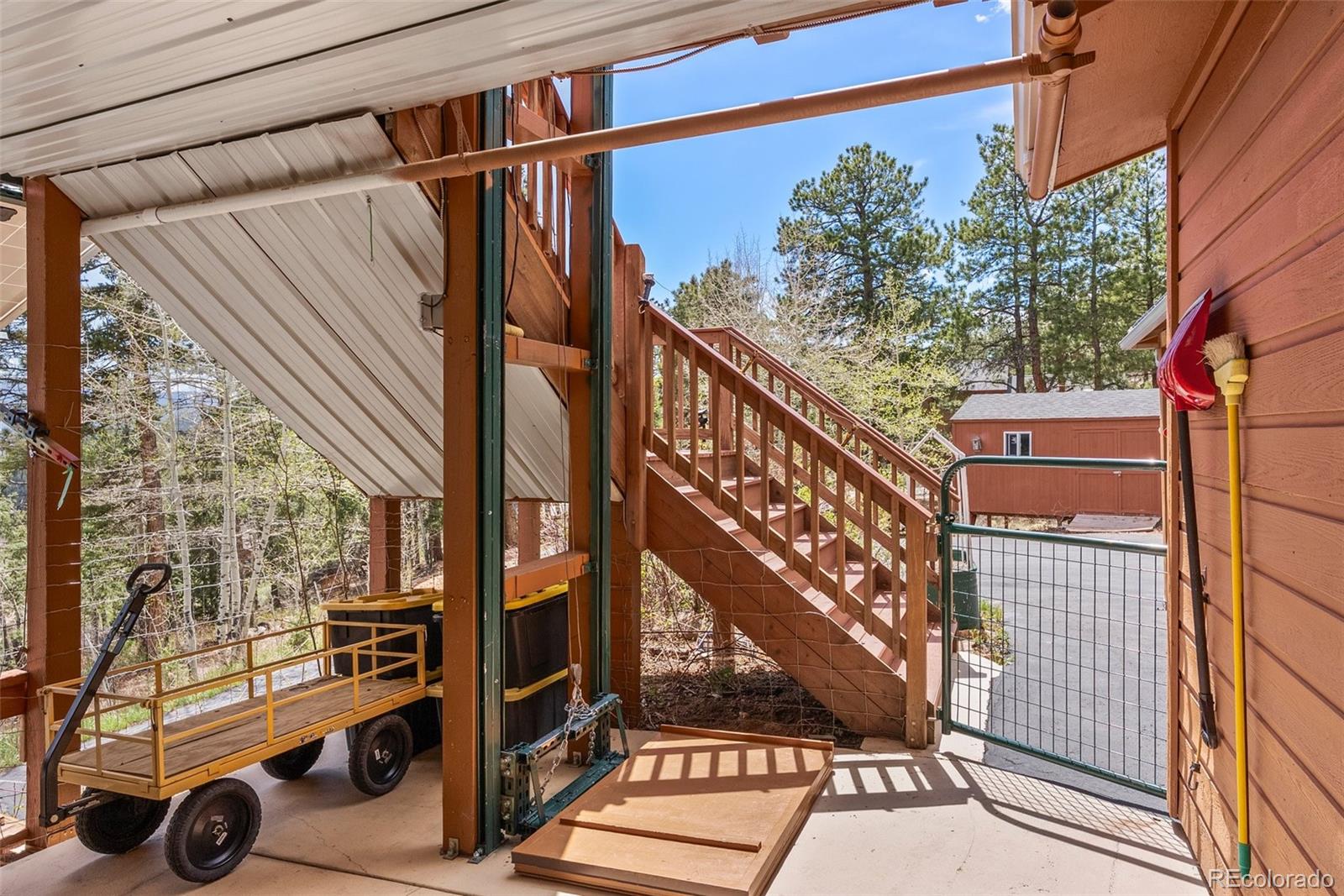 29 Cedar Lane Bailey, CO 80421 - Photo 25 of 46 a view of a balcony with car parked