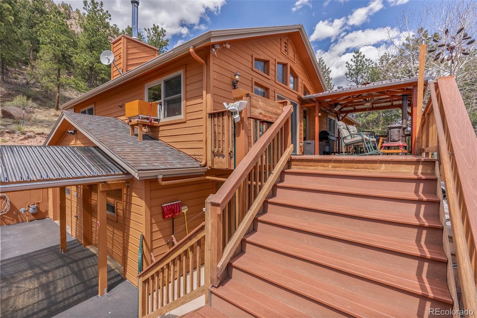 29 Cedar Lane Bailey, CO 80421 - Photo 27 of 46 a view of a house with wooden stairs