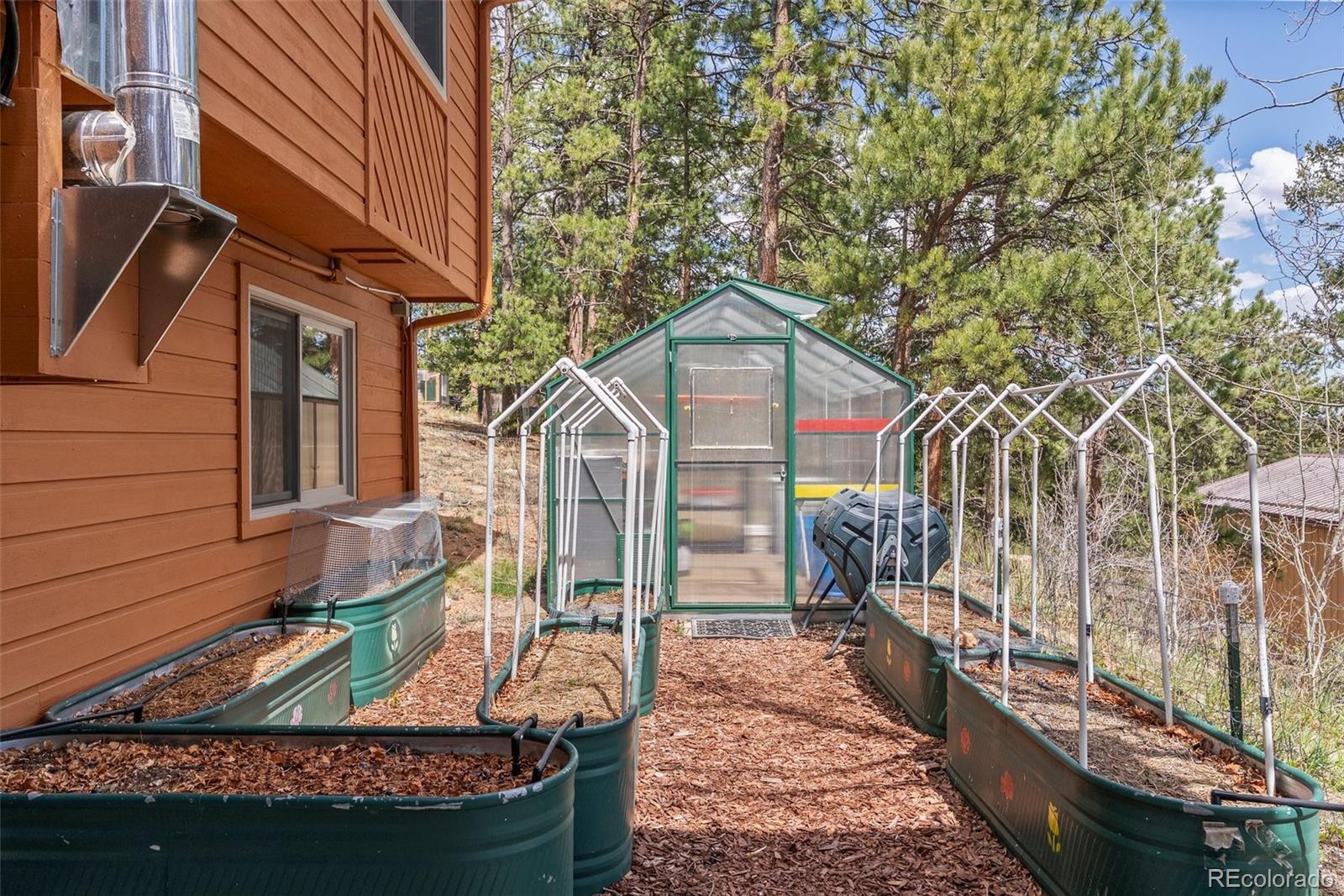 29 Cedar Lane Bailey, CO 80421 - Photo 31 of 46 a view of a house with wooden fence