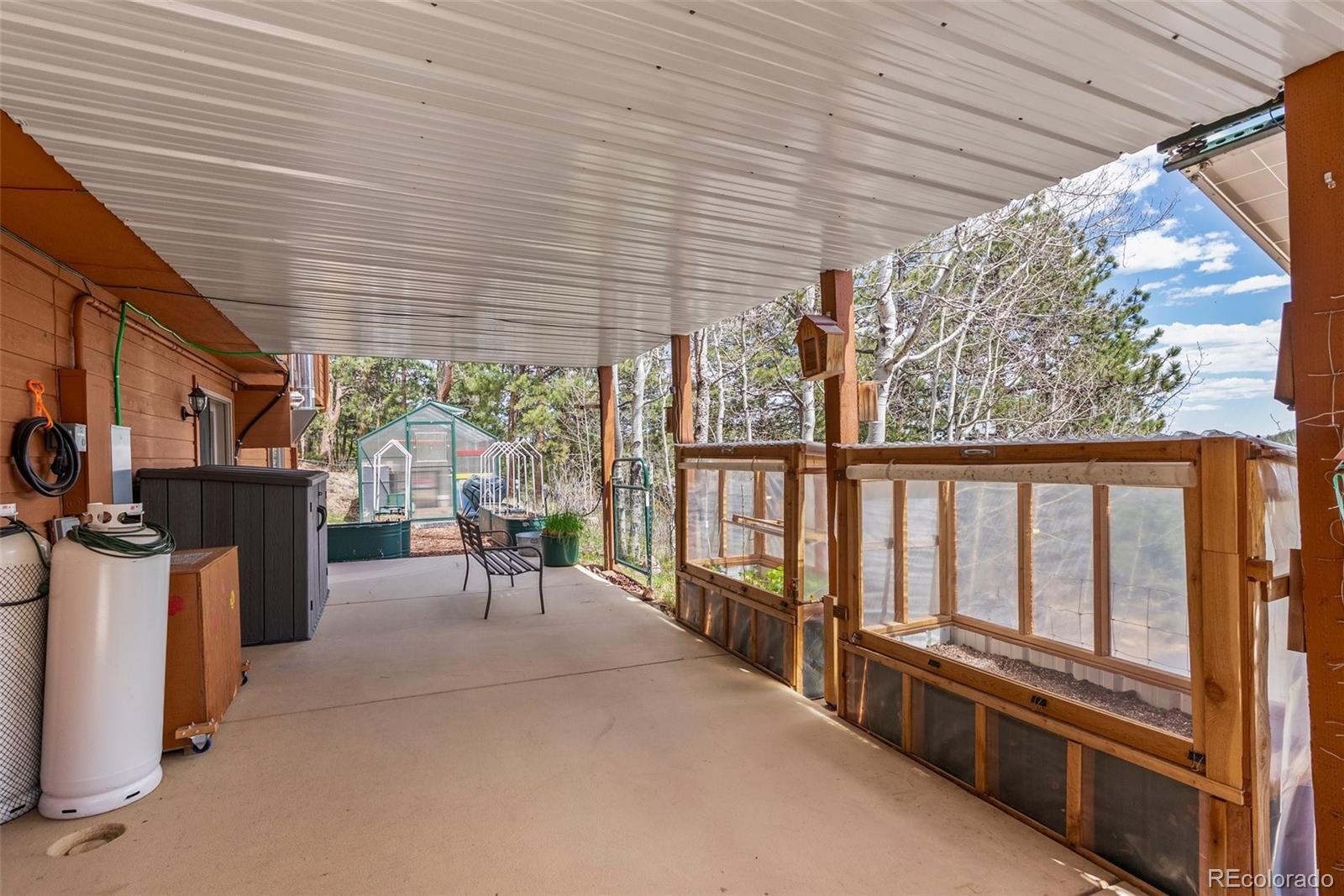 29 Cedar Lane Bailey, CO 80421 - Photo 33 of 46 a view of a porch with furniture