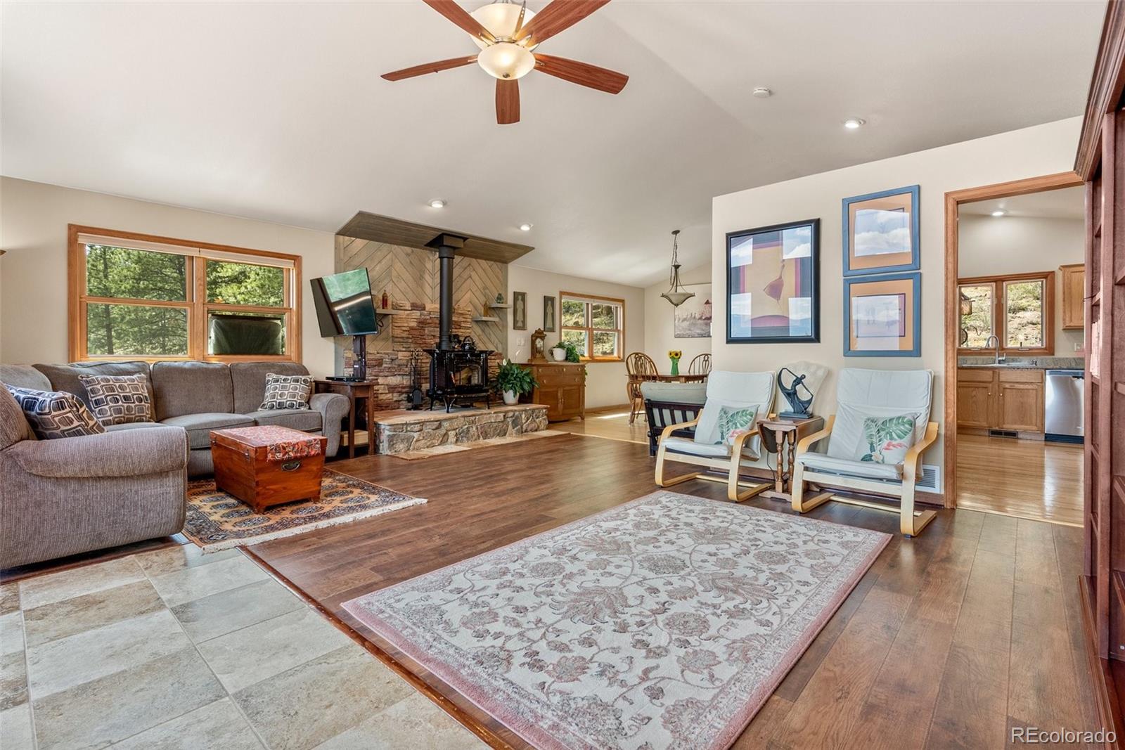 29 Cedar Lane Bailey, CO 80421 - Photo 4 of 46 a living room with furniture and a table