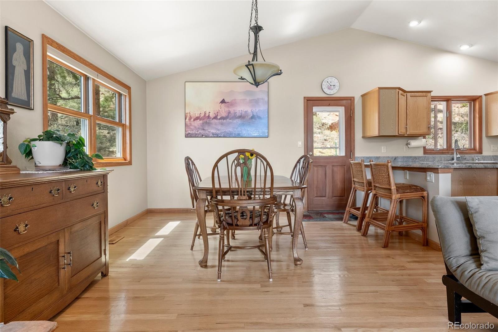 29 Cedar Lane Bailey, CO 80421 - Photo 10 of 46 a view of a dining room with furniture and wooden floor