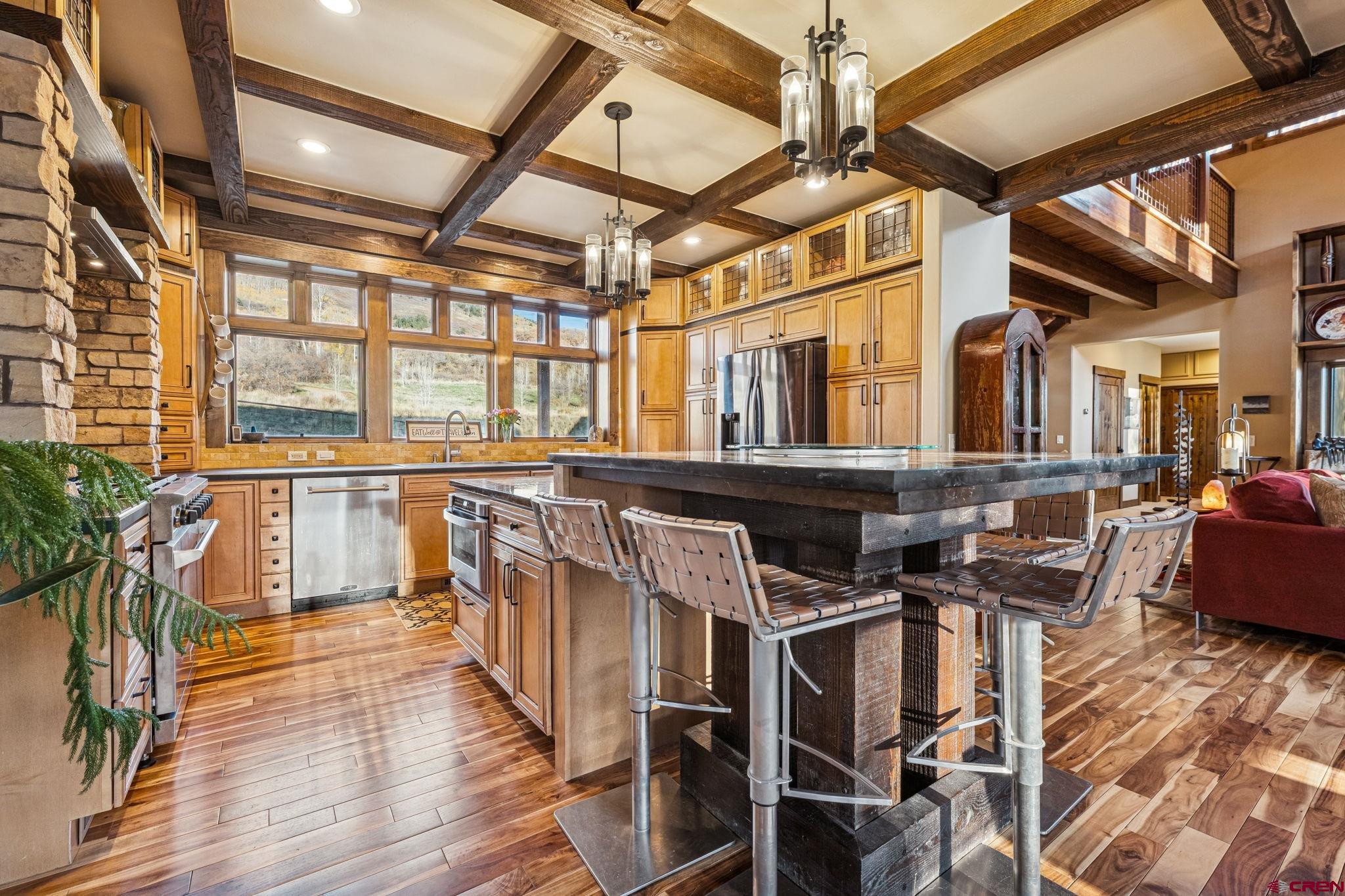 125 Quaking Aspen Road Durango, CO 81301 - Photo 12 of 45 a view of a kitchen with seating area