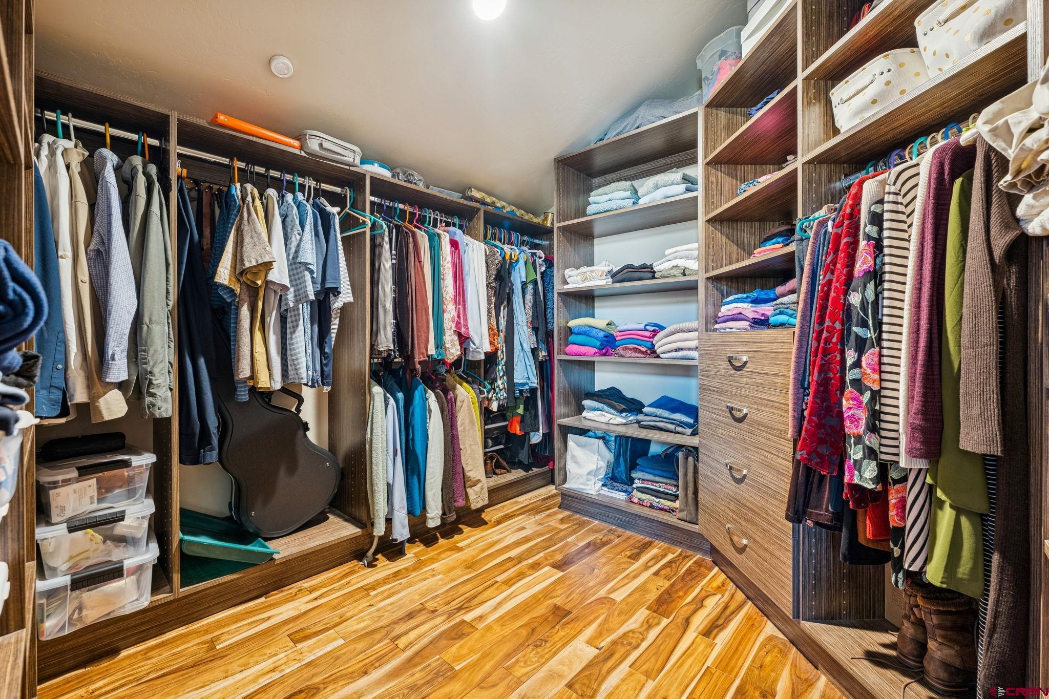 125 Quaking Aspen Road Durango, CO 81301 - Photo 22 of 45 a view of walk in closet with clothes and shoes