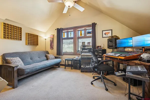 a living room with furniture and a window