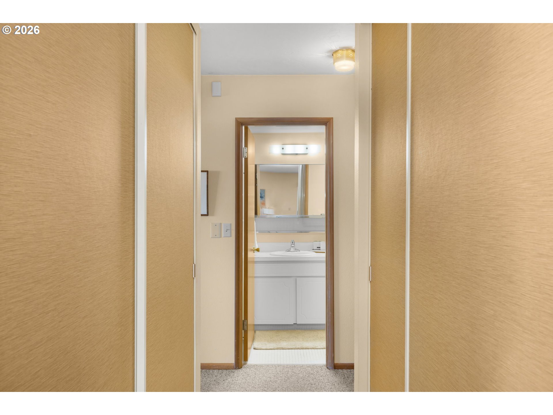 2393 Southwest Park Place, Unit 302 Portland, OR 97205 - Photo 19 of 35 a bathroom with a glass door