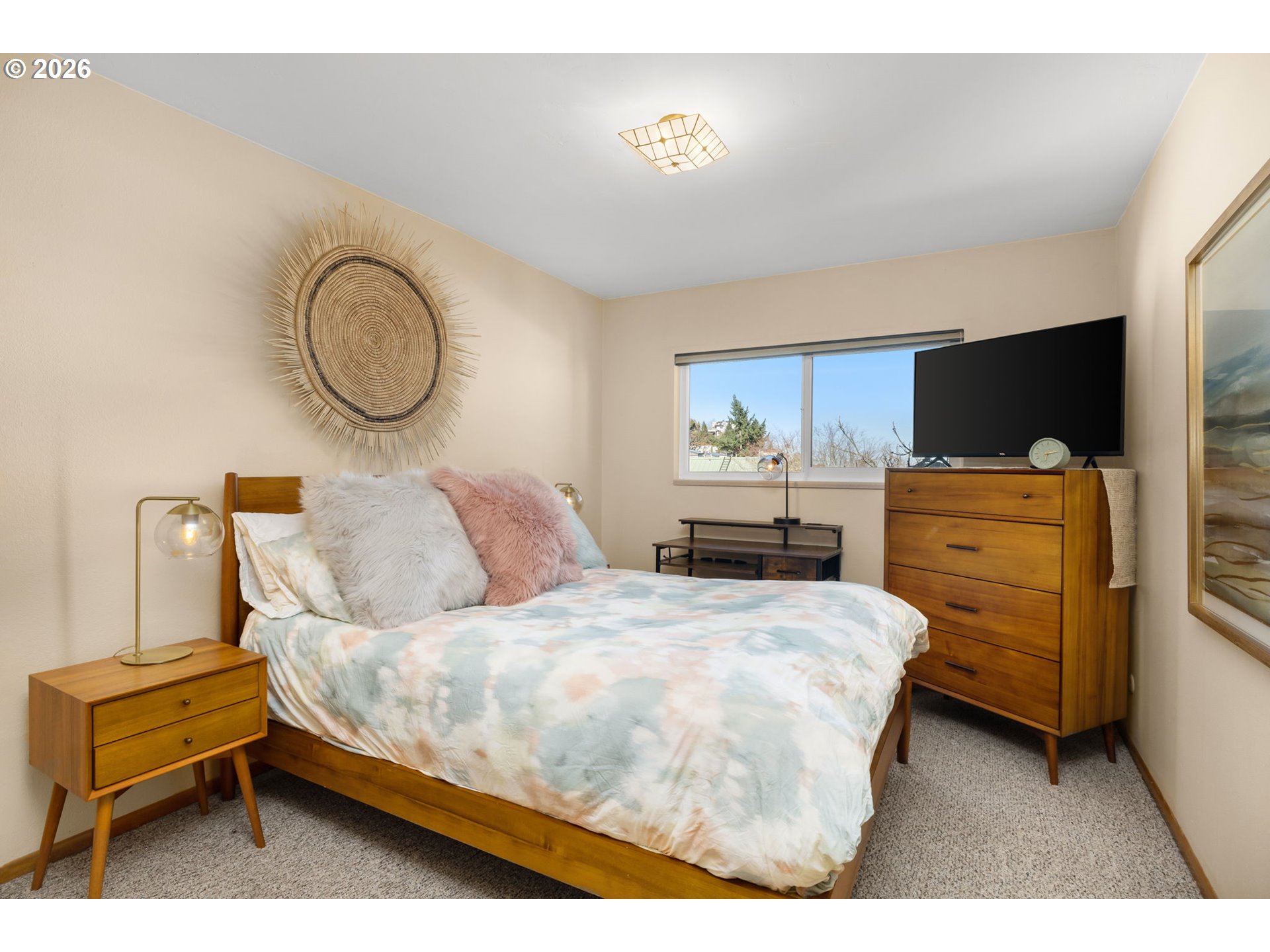 2393 Southwest Park Place, Unit 302 Portland, OR 97205 - Photo 25 of 35 a bedroom with a bed and furniture