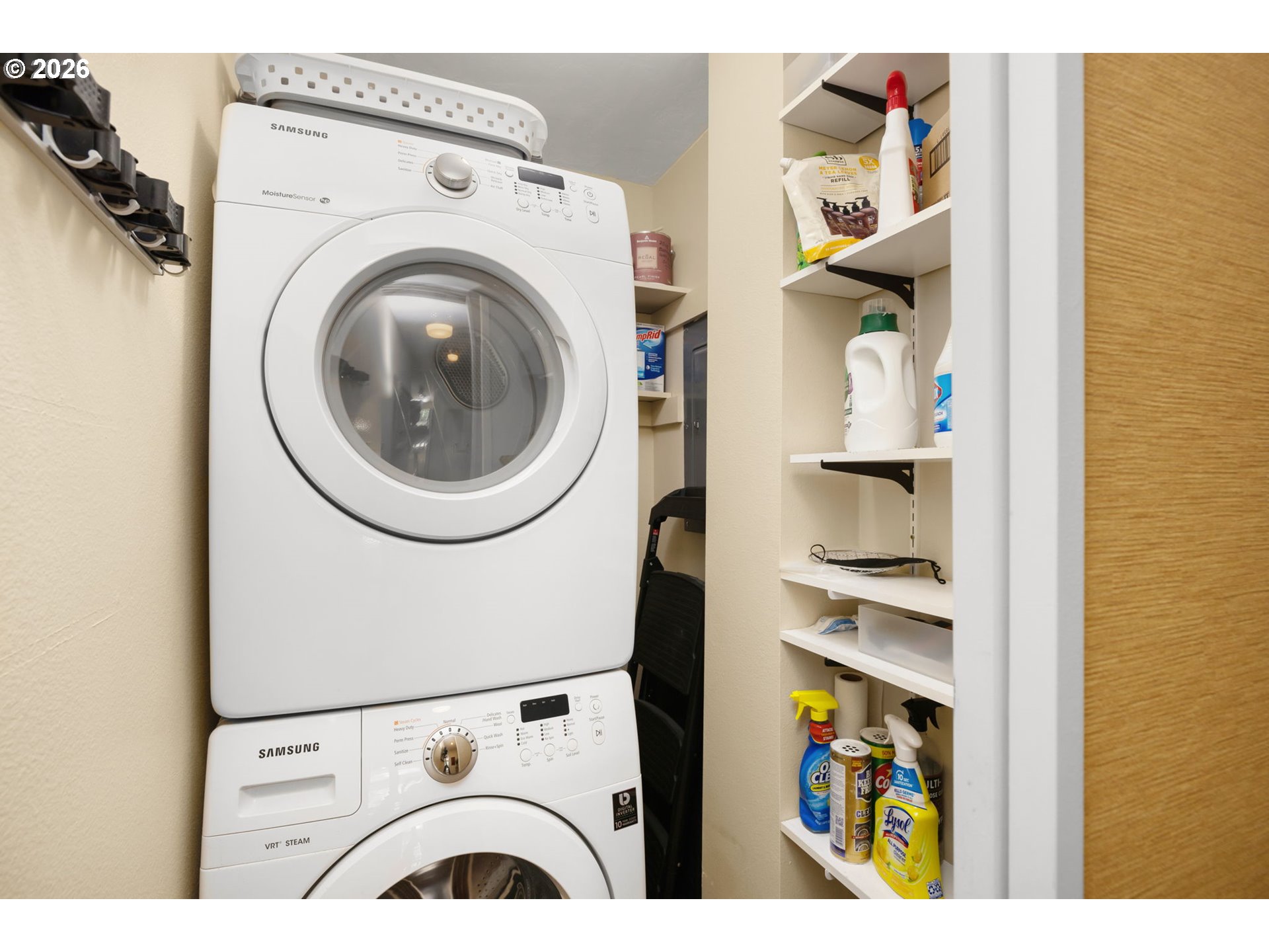 2393 Southwest Park Place, Unit 302 Portland, OR 97205 - Photo 28 of 35 a view of livingroom with washer and dryer