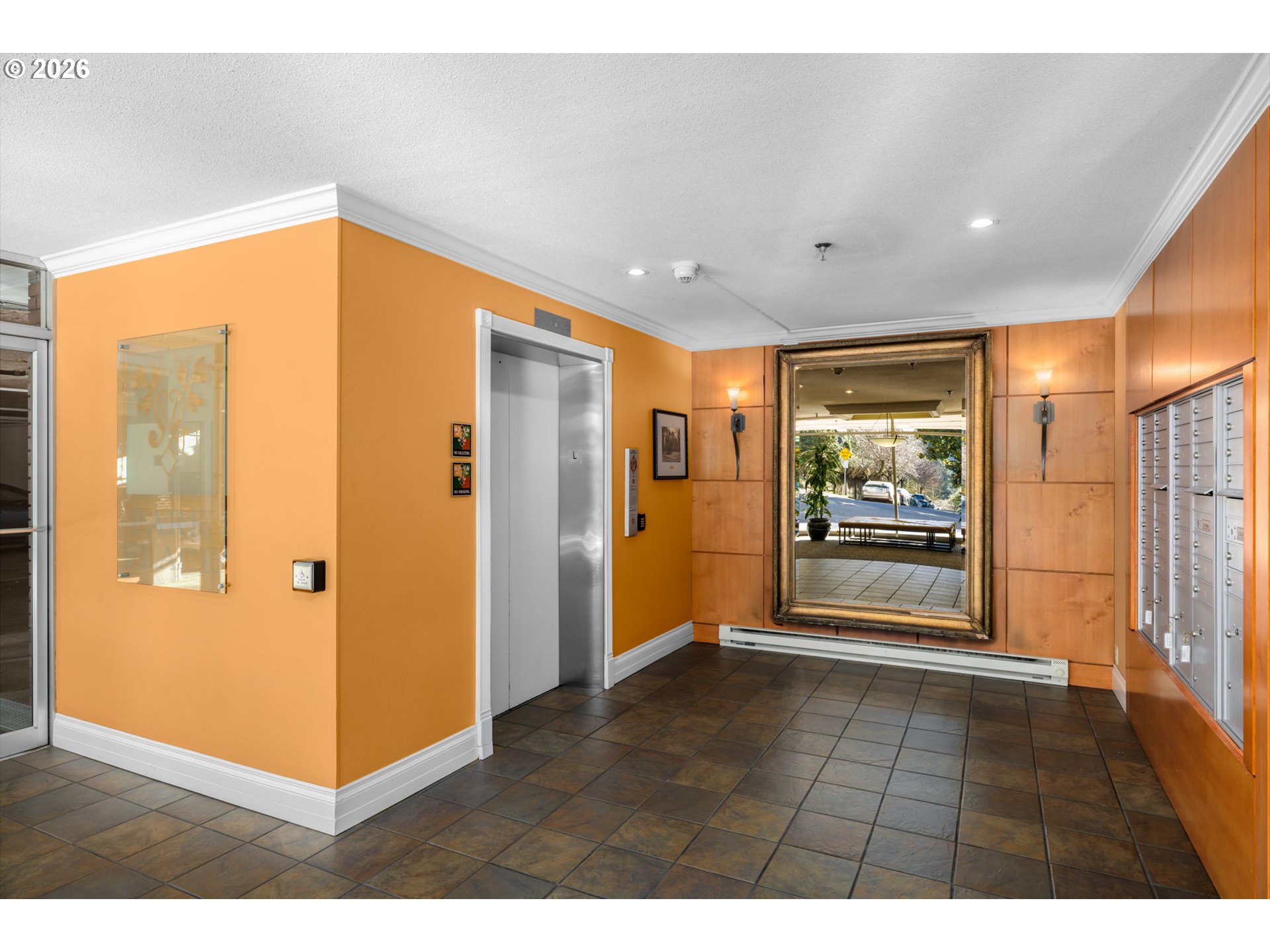 2393 Southwest Park Place, Unit 302 Portland, OR 97205 - Photo 30 of 35 a view of a hallway with wooden shelves