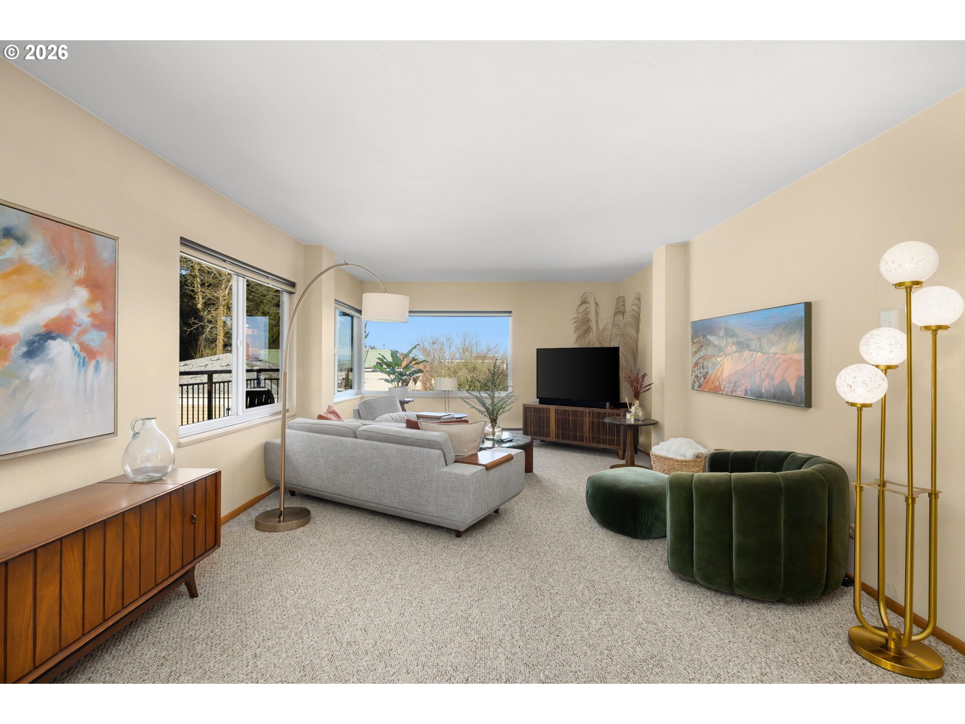 2393 Southwest Park Place, Unit 302 Portland, OR 97205 - Photo 3 of 35 a living room with furniture and a flat screen tv