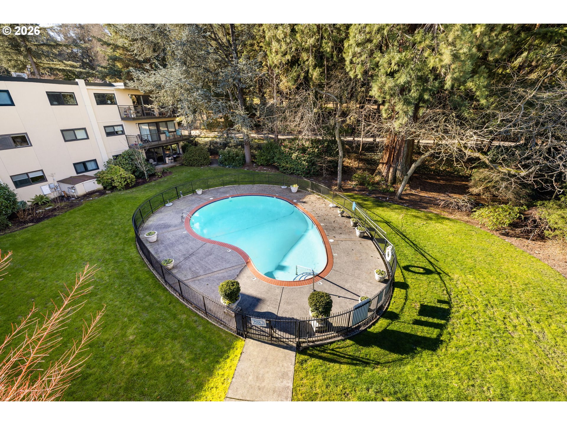 2393 Southwest Park Place, Unit 302 Portland, OR 97205 - Photo 31 of 35 an aerial view of a house having a yard