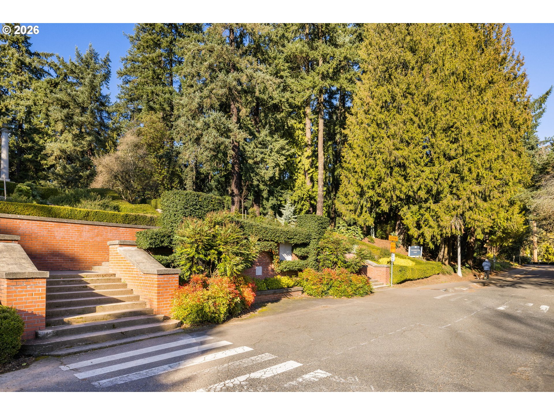 2393 Southwest Park Place, Unit 302 Portland, OR 97205 - Photo 32 of 35 a view of a yard with wooden fence