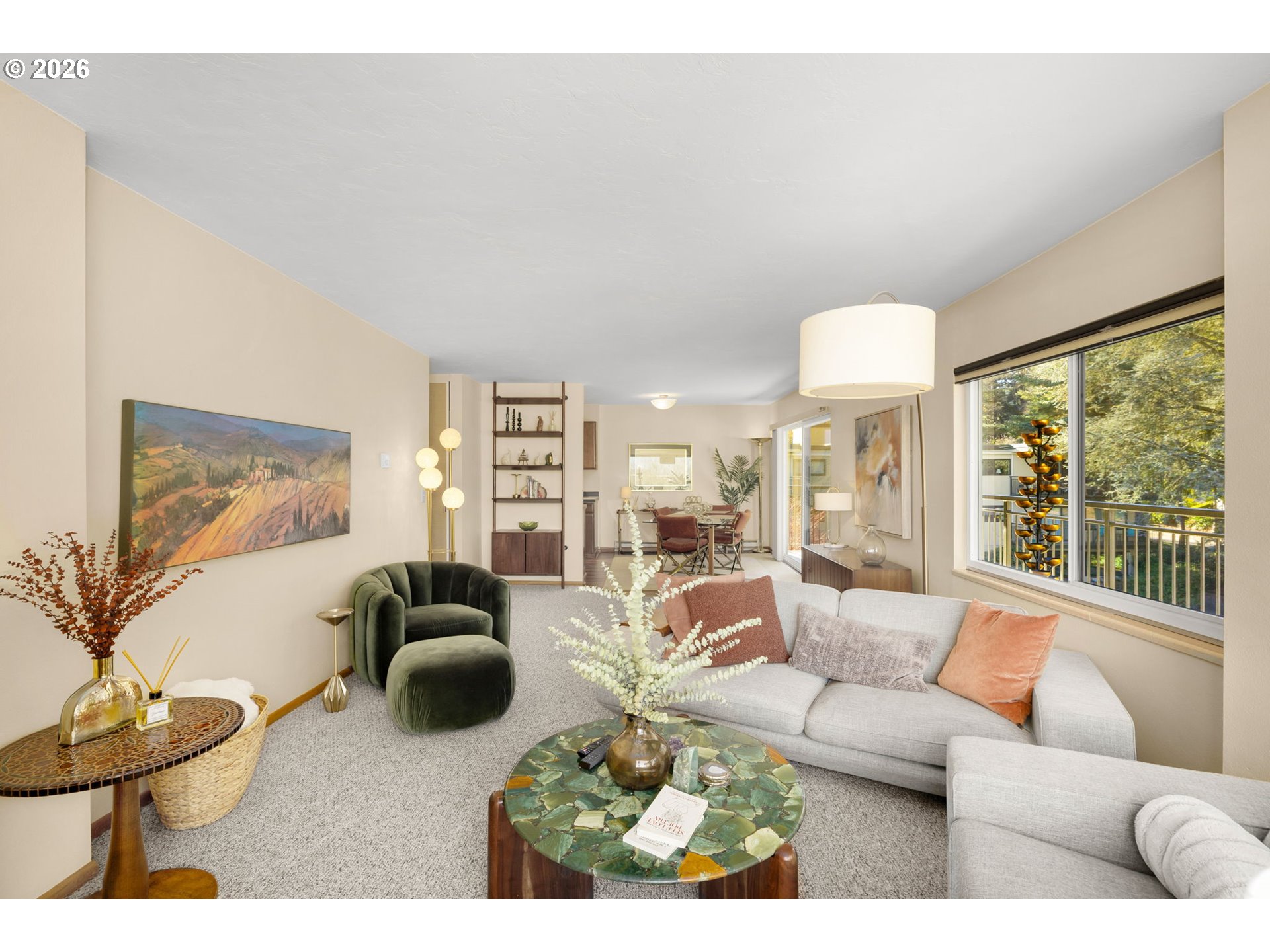 2393 Southwest Park Place, Unit 302 Portland, OR 97205 - Photo 6 of 35 a living room with furniture and a large window