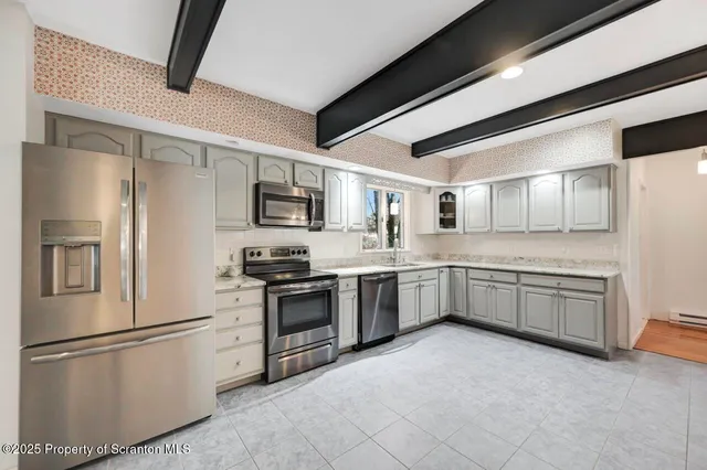 a picture of a bench in front of a wall