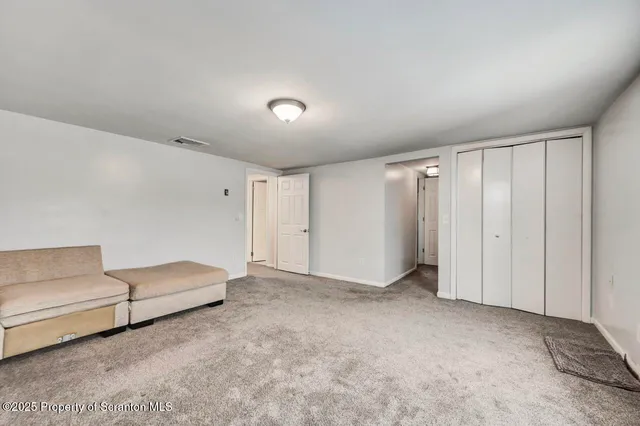 a view of a livingroom with a fireplace