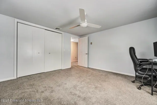 a kitchen with stainless steel appliances a stove a sink and a refrigerator
