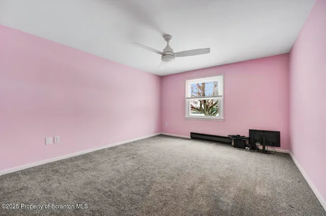 a view of a house with a snow in the yard